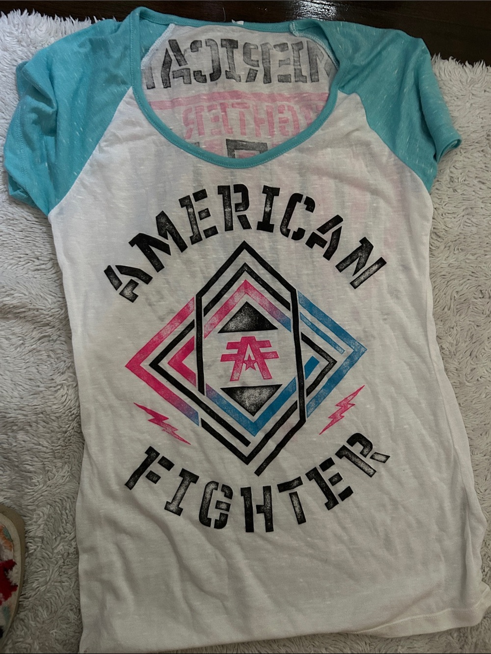 American Fighter White Tee with Blue Raglan Sleeves and Pink/Blue Graphic